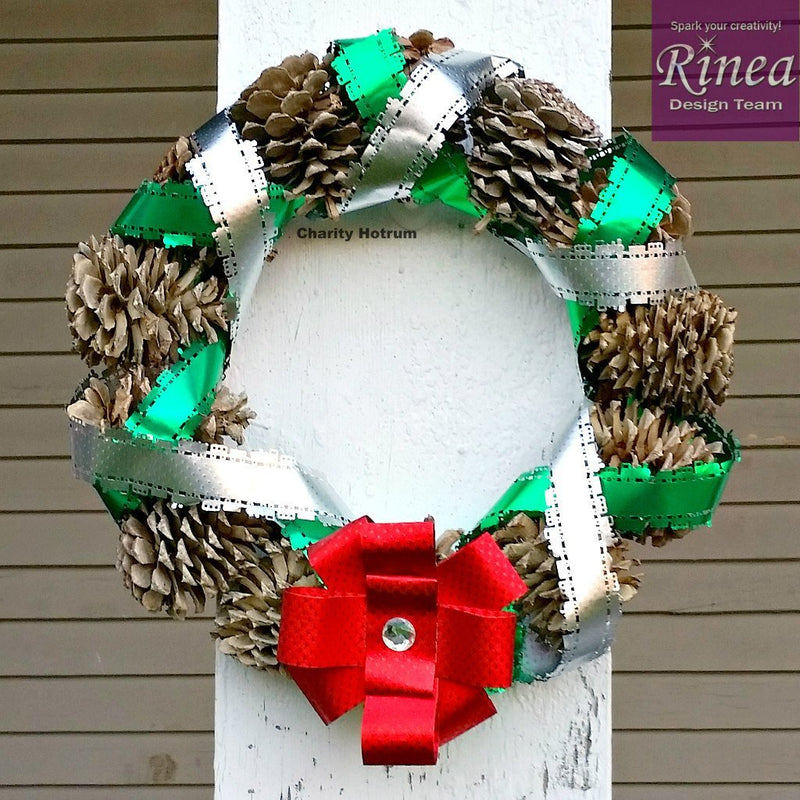 Pine Cone Wreath Wrapped With Foiled Paper Streamers by Charity | Rinea